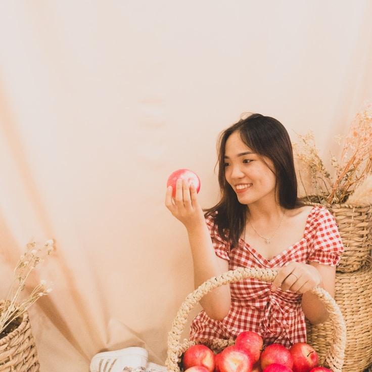 Jordan Rivera, Lead Design Curator at Breeze Crest Fold, reviewing corporate floral arrangements
