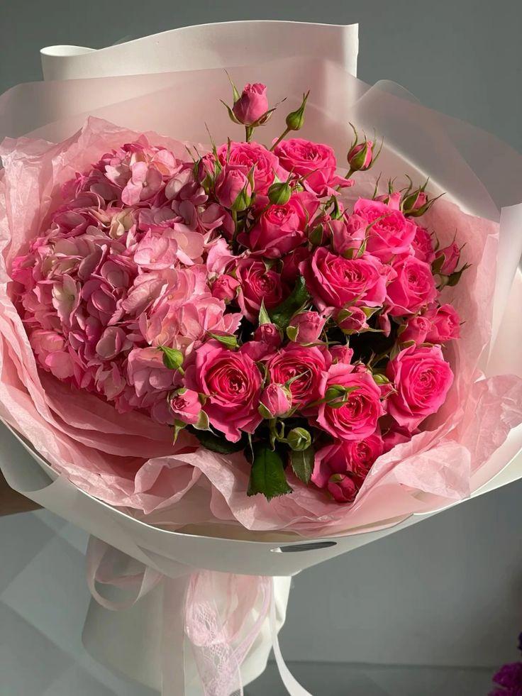 Corporate meeting room with carefully timed floral arrangements that maintain elegance throughout business hours